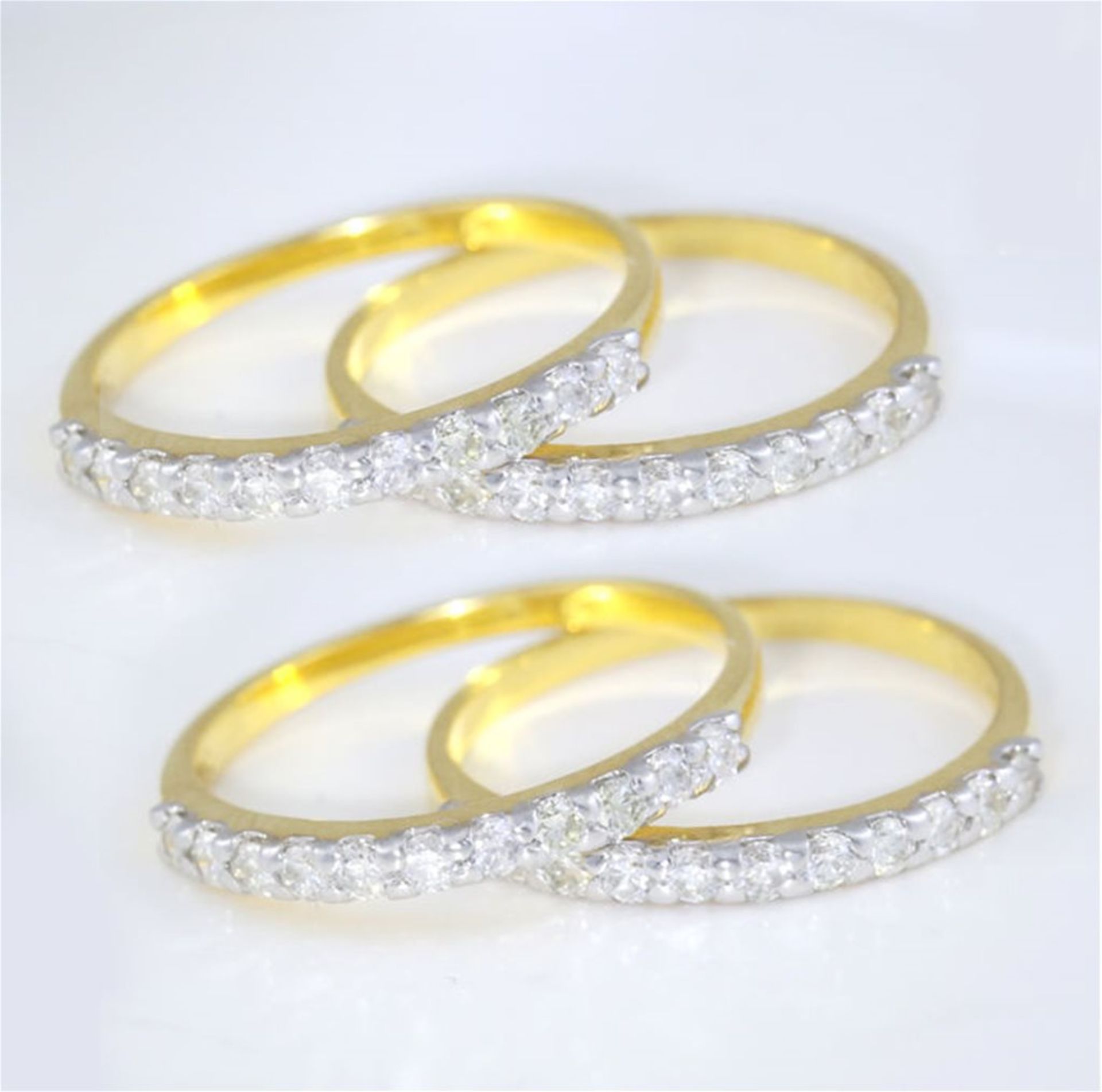 14 K / 585 Yellow Gold - Set of 4 Diamond Band Rings