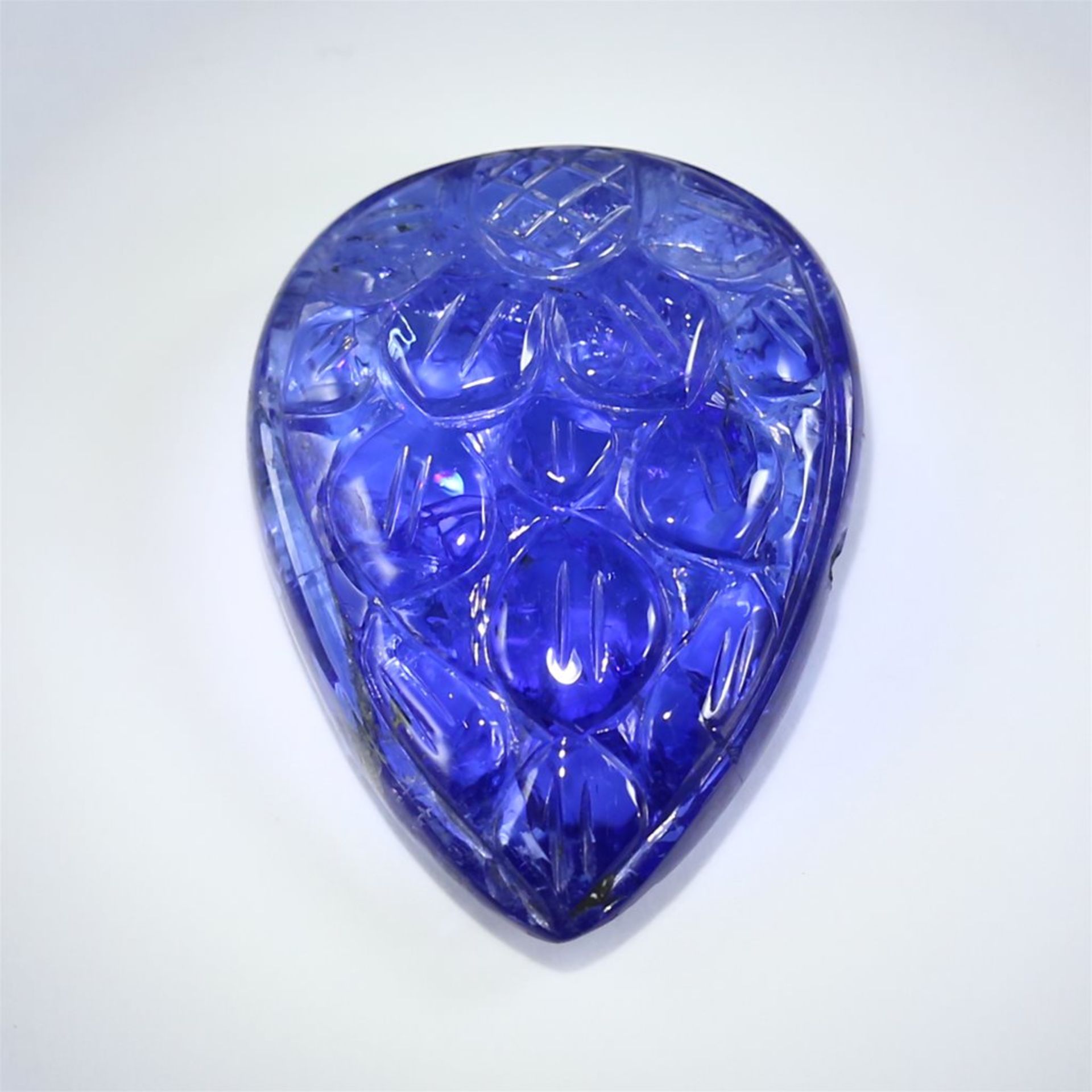 IGI Certified 27.36 ct. Tanzanite Pear Carving