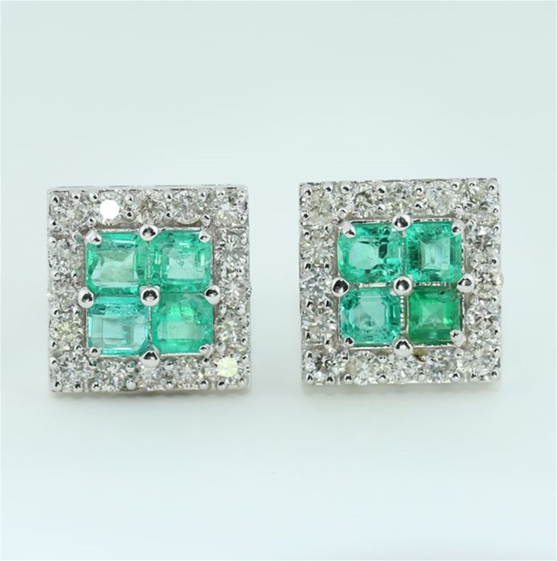 IGI Certified 14 K / 545 White Gold Diamond and Emerald Earrings