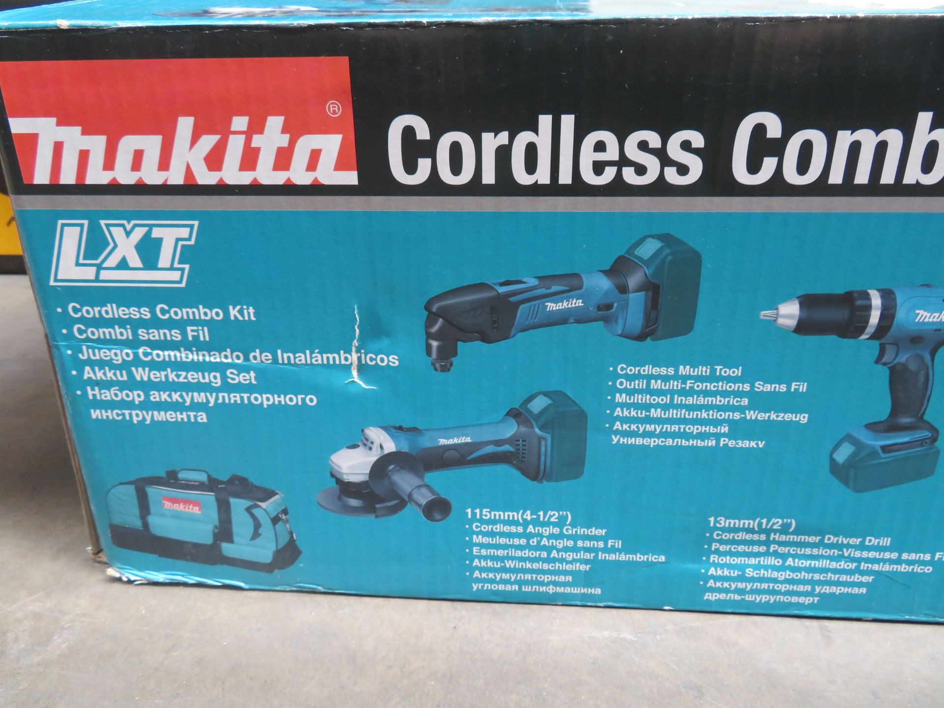 (A8) Makita Dlx6075M 18V 4.0Ah Li-Ion Lxt Cordless 7 Piece Kit - New Condition, Slightly Worn Box. - Image 2 of 5