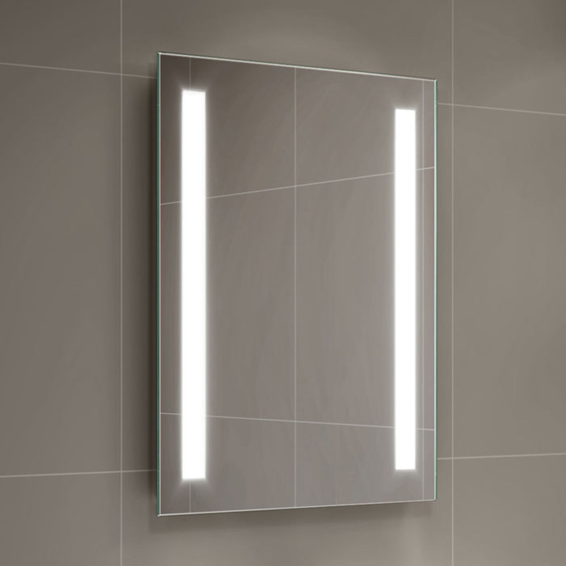 (T65) 500x700mm Omega LED Mirror - Battery Operated. Energy saving controlled On / Off