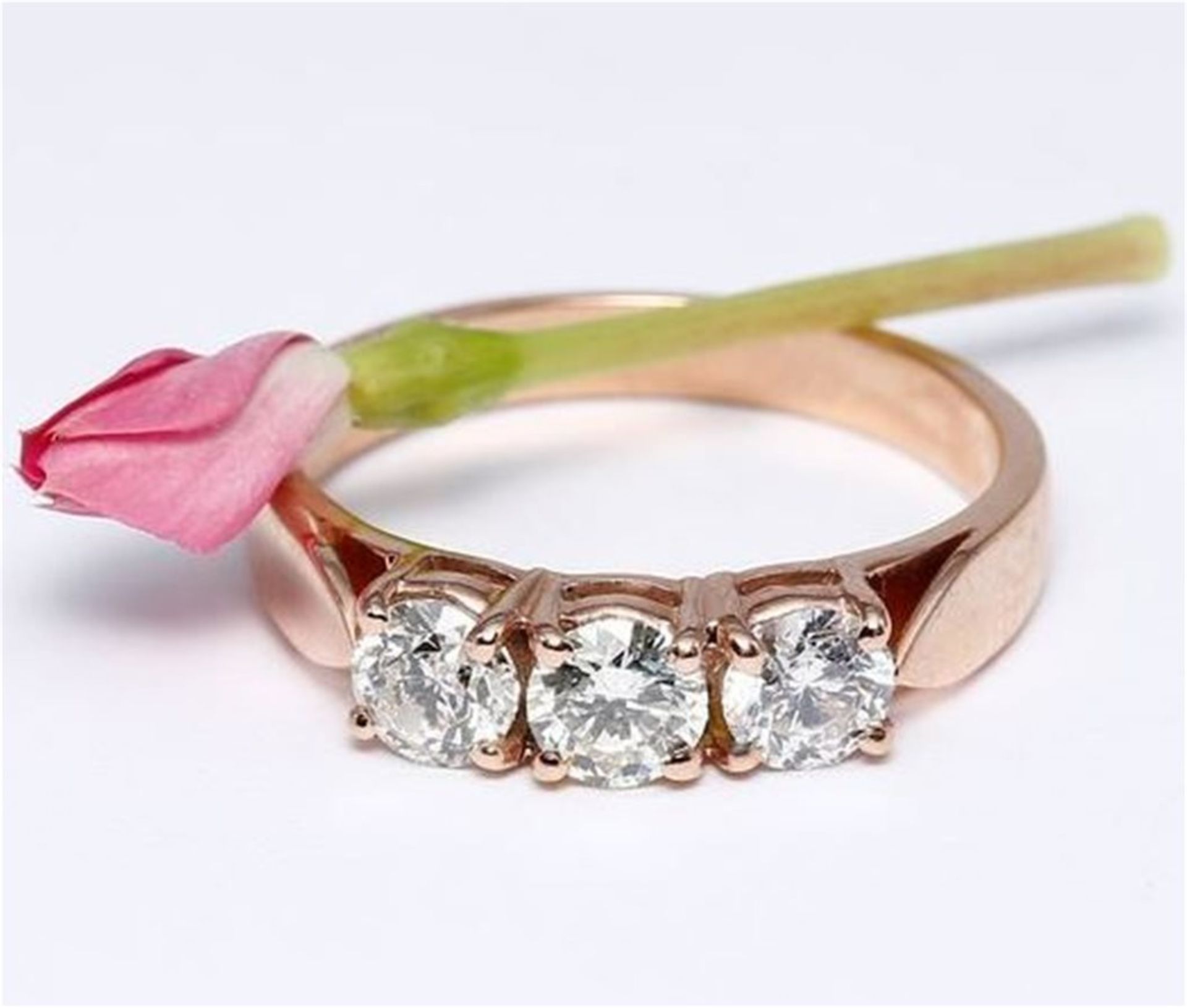 IGI Certified 14 K / 585 Rose Gold Trilogy Solitaire Diamond Ring