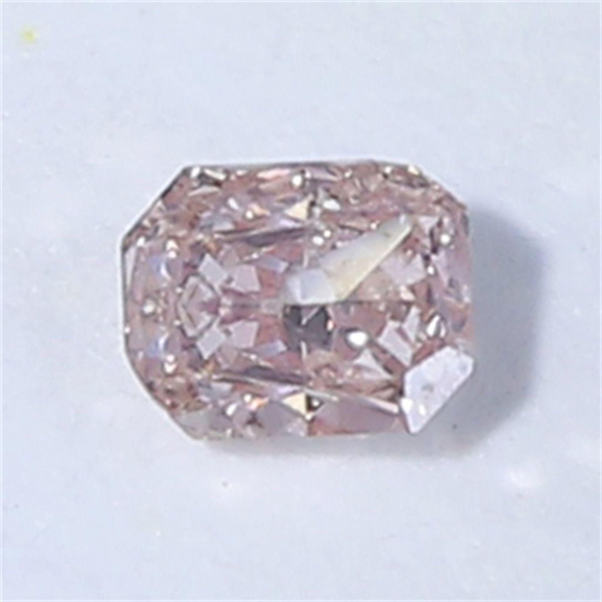 GIA Certified 0.08 ct. Fancy Orangy Pink Diamond