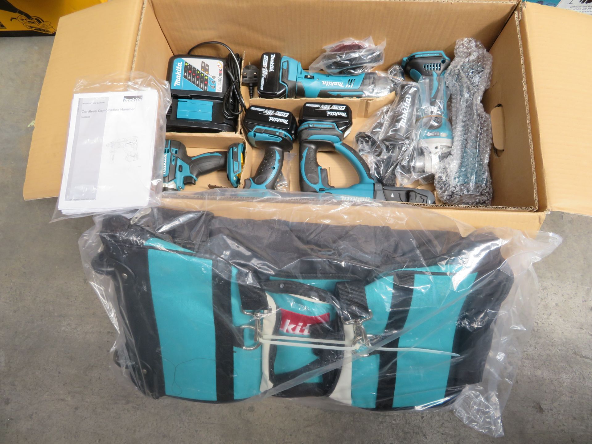 (A8) Makita Dlx6075M 18V 4.0Ah Li-Ion Lxt Cordless 7 Piece Kit - New Condition, Slightly Worn Box. - Image 4 of 5