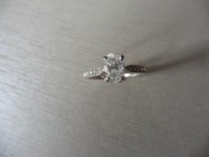 0.82ct oval diamond set solitaire ring. Centre diamond G/H colour, Si3 clarity. Shoulders micro
