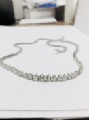 6.50ct Diamond tennis style necklace. 3 claw setting. Graduated diamonds, I colour, Si2 clarity
