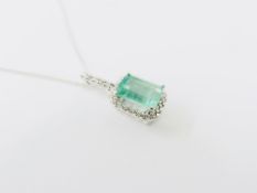 18ct white gold Emerald diamond pendant(6mmx4mm emerald cut emerald natural Zambian stone)0.12ct