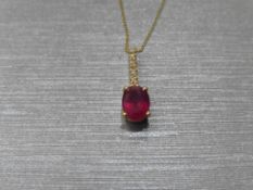 0.80ct ruby and diamond drop style pendant. 7X 5mm oval ruby set with 5 small brilliant cut