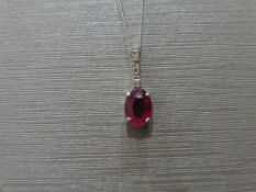 0.80ct Ruby and diamond drop style pendant. 7X 5mm oval ruby set with 5 small brilliant cut