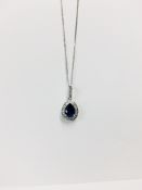 18ct white gold Sapphire and diamond pendant,1ct pearshape ruby (treated),23 diamonds g Coloured