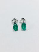 Emerald and Diamond drop earrings. Each set with a 7 x 5mm oval cut emerald ( treated), 1.60ct