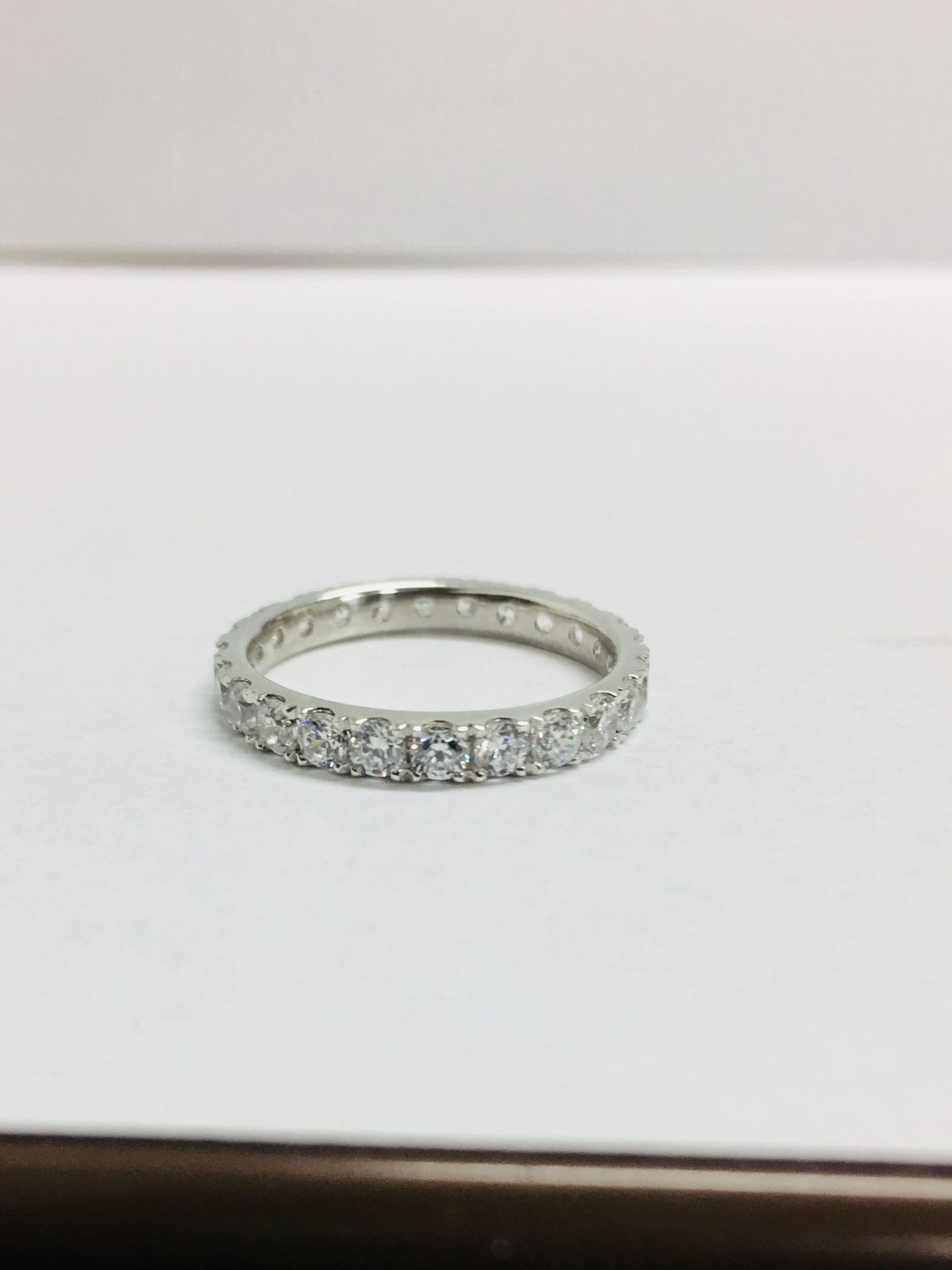 1.50ct full diamond band ring. Brilliant cut diamonds, I colour, si3 clarity. Claw setting. Size - Image 2 of 5