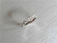 0.70ct diamond seven stone ring. 7 brilliant cut diamonds, I colour, si2-3 clarity. 4 Claw setting