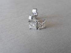 Platinum princess cut diamond earrings.0.50ct diamond ,si3 clarity h colour(0.35ct each),1.9gms