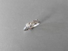 0.75ct diamond trilogy ring set in platinum. 3 brilliant cut diamonds, I/J colour and si3 clarity. 4
