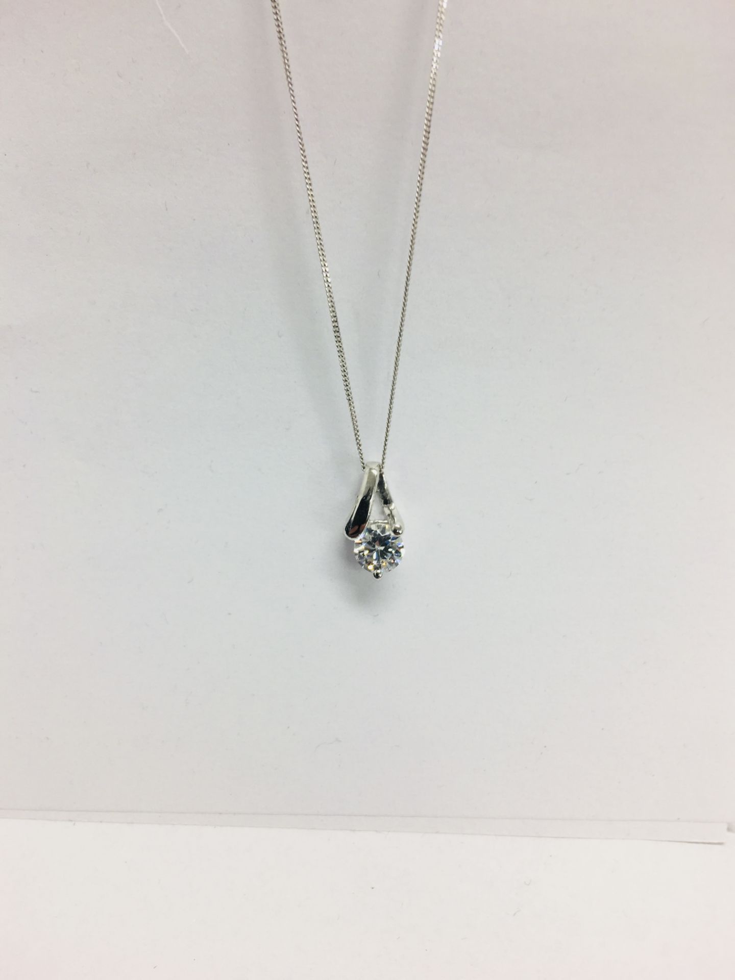 0.75ct diamond pendant with an brilliant cut diamond. H colour and I1-2 clarity. Set in platinum 3