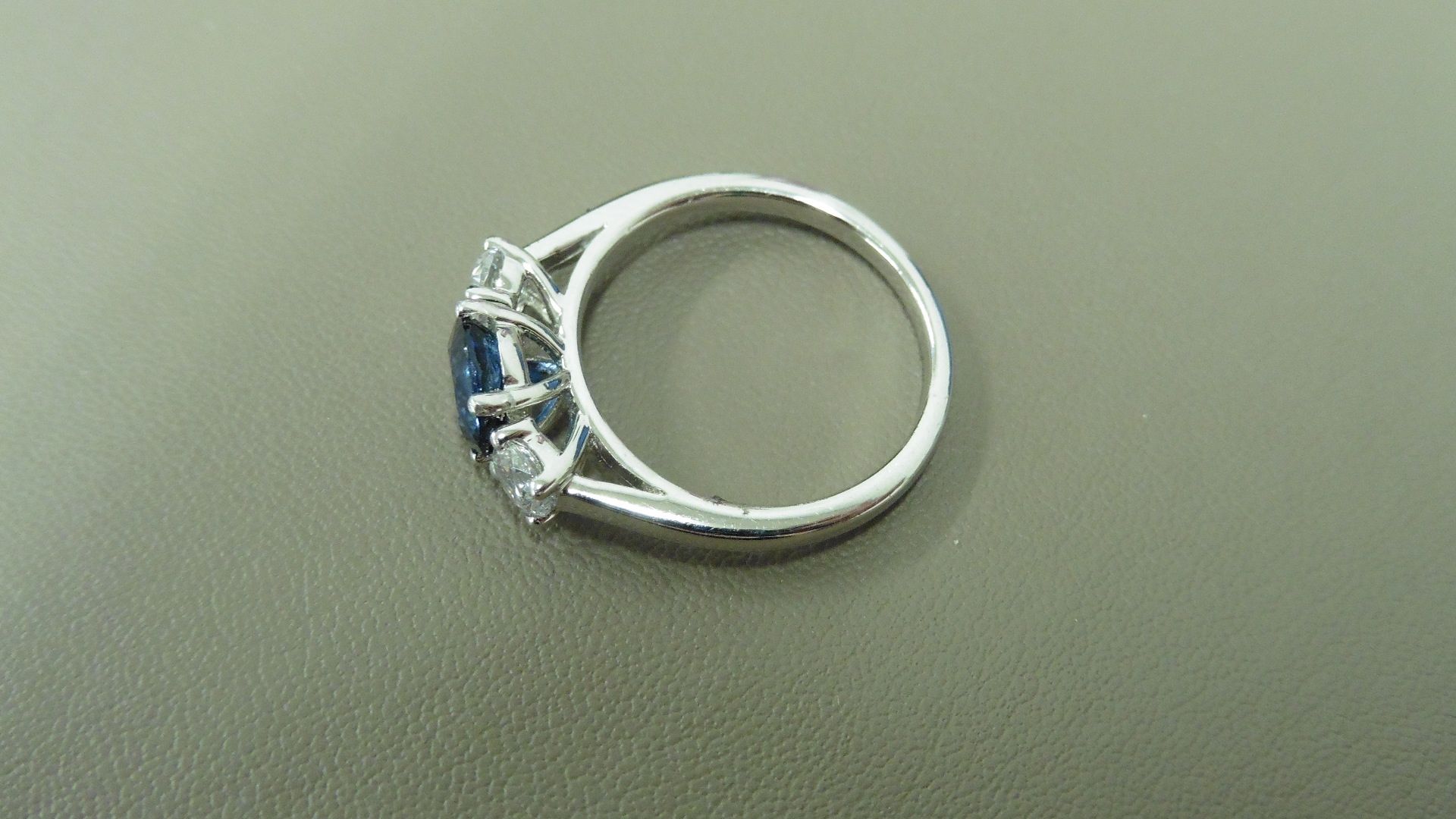 Sapphire and diamond trilogy ring. 5mm round cut sapphire ( treated ) with a brilliant cut diamond - Image 3 of 3