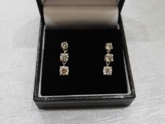 1.20ct diamond trilogy drop earrings. I-J colour, si2 clarity weighing 1.20ct total. Claw setting in