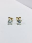 1.00ct diamond solitaire earrings set in 18ct yellow gold. 2 x brilliant cut diamonds, 0.50ct (