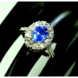 14 K / 585 White Gold Blue Sapphire (IGI certified) and Diamond Ring