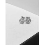1ct diamond stud earrings ,h colour vs clarity halo set ,18ct white 3.2gms heavy mounts diamond