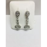 18ct white gold fantasy drop earrings ,6 oval diamonds total weight 0.78ct,6 pearshape diamonds 1.