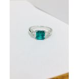 18ct Emerald and diamond three stone,gem quality natural Emerald 1.45ct,0.69ct trillion cut vs