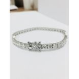 10ct diamond bracelet ,diamonds h colour si grade ,44x 3.75mm diamonds,11.75gms 18ct white gold 7Ó,