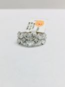 18ct white gold pearshape diamond ring,12 pearshape diamonds 1.48ct h colour vs grade,4 princess cut