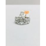 18ct white gold pearshape diamond ring,12 pearshape diamonds 1.48ct h colour vs grade,4 princess cut