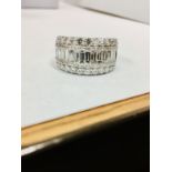 2.36ct diamond dressy ring,1.16ct brilliant cut,1.16ct emerald cut h colour si grade,9.89gms 18ct