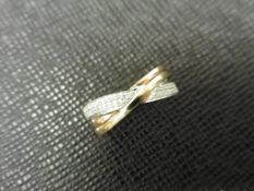 0.14ct diamond crossover band ring set in 9ct gold. Tro coloured gold with a 2 row band of brilliant