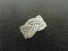 0.40ct celtic style diamond band ring set in 9ct white gold. Micro claw setting. G-H colour and SI
