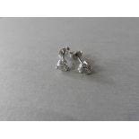 1.00ct Solitaire diamond stud earrings set with brilliant cut diamonds, i1 clarity and I colour. Set