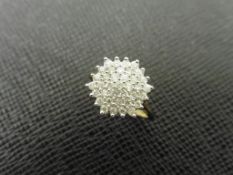 0.75ct diamond cluster ring set in 9ct gold. Brilliant cut diamonds, H colour and I2-3 clarity. Claw