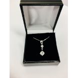 0.60ct diamond drop pendant set in 18ct white gold. 0.50ct on the bottom with 0.10ct on top. I-J