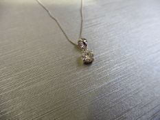 0.15ct diamond solitaire pendant set in 18ct gold. 4 claw setting, plain bale. I colour and si3