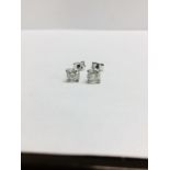 1.00ct Solitaire diamond stud earrings set with brilliant cut diamonds, i1 clarity and I colour. Set