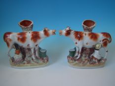 Pair Staffordshire Pottery cow & milkmaid/milkman spill vases