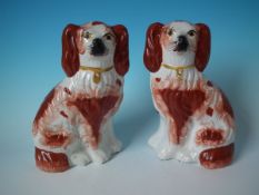 Pair Staffordshire Pottery russet&white spaniels