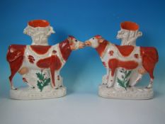Pair Large Staffordshire Pottery 'Milk Sold Here' cow spill vases