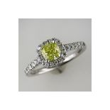 A New Cushion Cut Intense Yellow Diamond Halo Ring