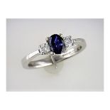 A "Restored" Three Stone Sapphire and Diamond Ring