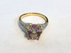 Platinum over sterling silver diamond and Amethyst ring