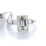 18ct White Gold Single Stone Emerald Cut Diamond Ring With Baguette Shoulders 3.19