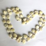 vintage brass and Mother of Pearl natural beads double strand necklace