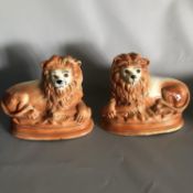Antique Pair 19th Century Staffordshire Pottery Recumbent Lions with Glass Eyes