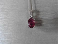 1ct ruby and diamond pendant with an 7x5mm oval cut ruby ( fracture treated ) and a diamond set