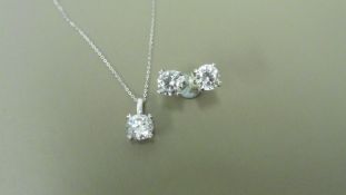 0.45ct / 0.80ct diamond pendant and earring set in platinum. Pendant - 0.40ct brilliant cut diamond,