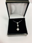 0.60ct diamond drop pendant set in 18ct white gold. 0.50ct on the bottom with 0.10ct on top. I-J